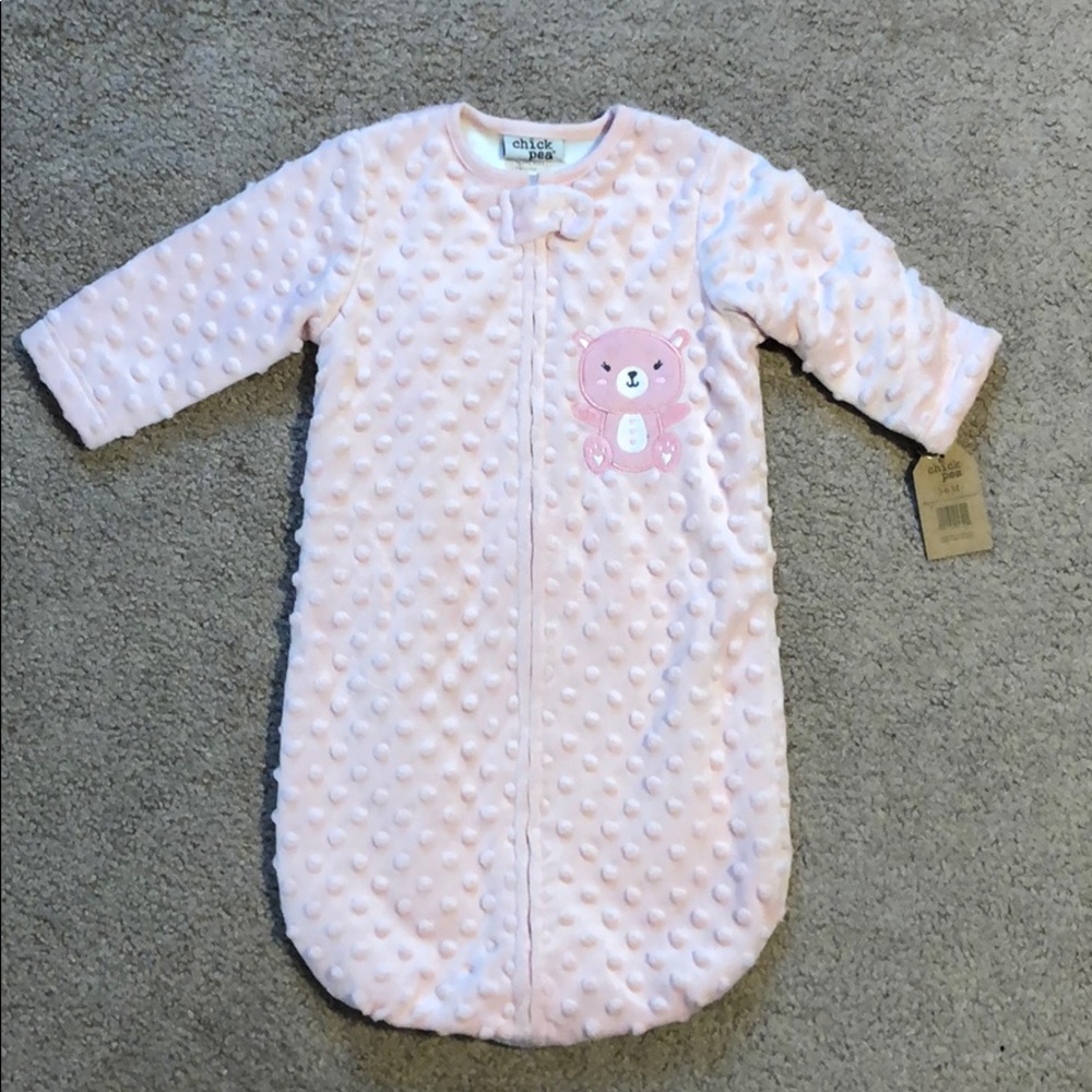 Soft pink zip up bag type outfit